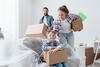 Family with moving boxes